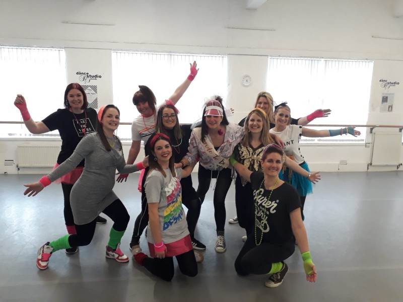 Hen party group having fun at ABBA dance class Brighton
