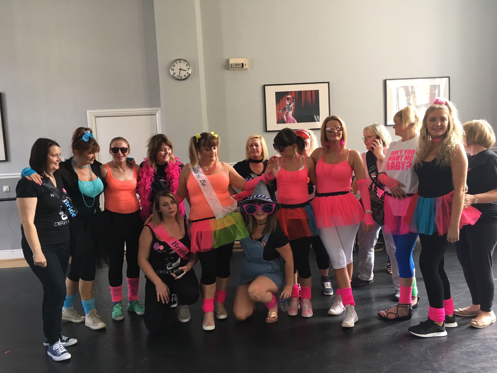 Happy hen party group dancing samba in Brighton